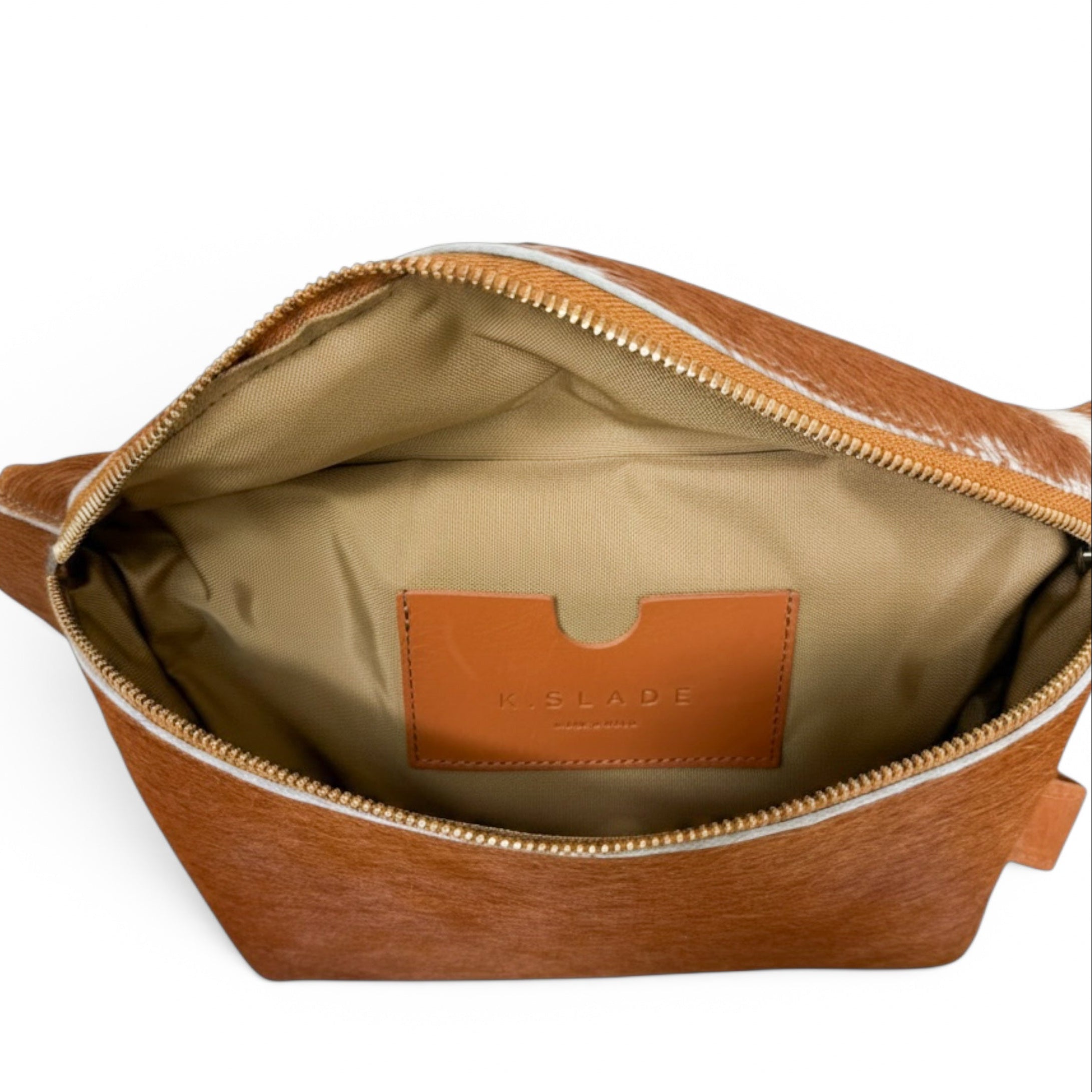 Open tan leather pouch with a cream-colored interior lining and a tan leather brand patch reading 'K.SLADE' on the inside, shown on a white background.